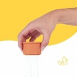 Badabulle Set di 7 tazze impilabili numerate - Giocattoli da bagno in morbido silicone - immagine 4