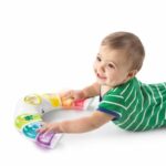 BABY EINSTEIN - Piano musical - Juguete de actividades con luces, música y sonajero, 3 modos - Multilingüe - immagine 2
