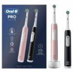 Oral-B Pro Series 1 Pack de dos cepillos de dientes eléctricos rosa y negro, 2 cabezales, diseñado por Braun