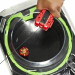 Beyblade X, pacchetto trottola Soar Phoenix 9-60GF con lanciacorda deluxe - immagine 5