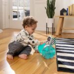 BABY EINSTEIN Little Elephant Rolling Toy, Music and Lights, Interactive and Multilingual, Motor Skills Development - Image 2