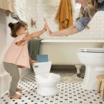 INGENUITY Mini Children's Toilet with Toilet Reducer Included, Musical Flush and Integrated Wipe Storage White - Image 2
