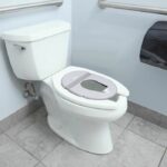 INGENUITY Universal portable toilet seat reducer for children, babies, for travel or on the go. Storage bag included, foldable - Image 2