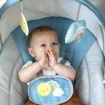 Ity by INGENUITY Sun Valley Baby Swing - Canopy, 2 Toys, 2-Position Reclining Seat - Grey - Image 2